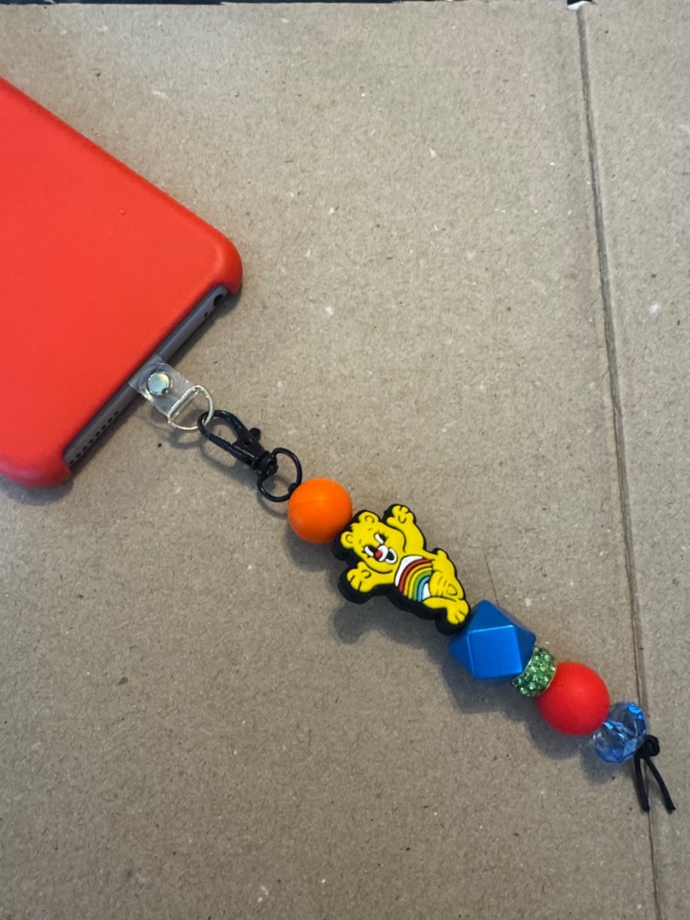 Care Bears Yellow Rainbow Bear Phone Charm with Red, Orange & Blue Beads